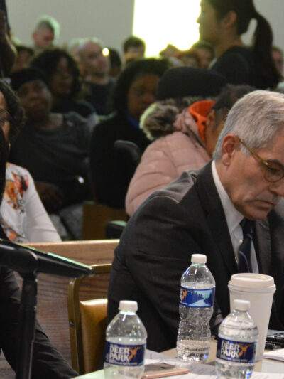 Helen Gym and Larry Krasner at a hearing
