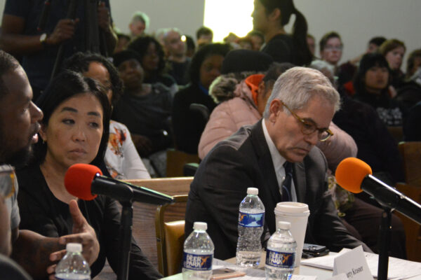 Helen Gym and Larry Krasner at a hearing