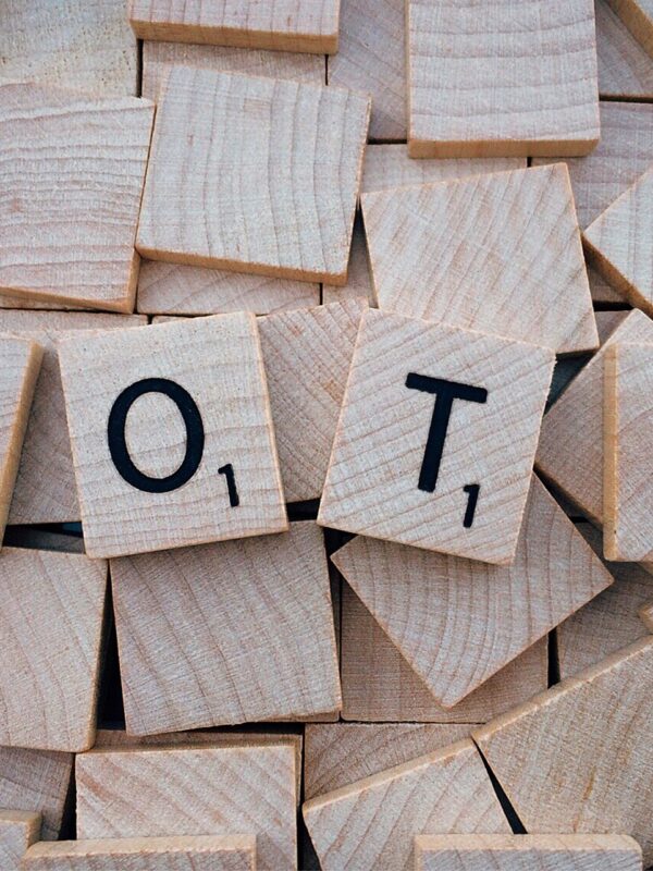 Scrabble tiles spelling out 'Vote'
