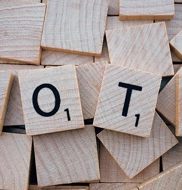 Scrabble tiles spelling out 'Vote'