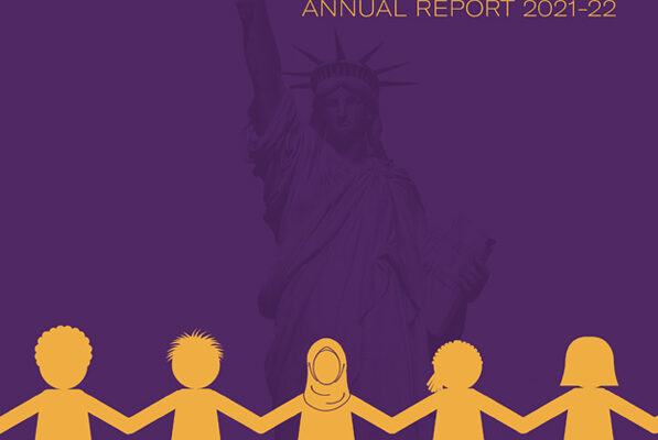 purple cover with gold text "Defending Liberty Hand-in-Hand: Annual Report 2021-22" darker purple image of statue of liberty in the background and diverse paper cutout people holding hands in gold across the bottom