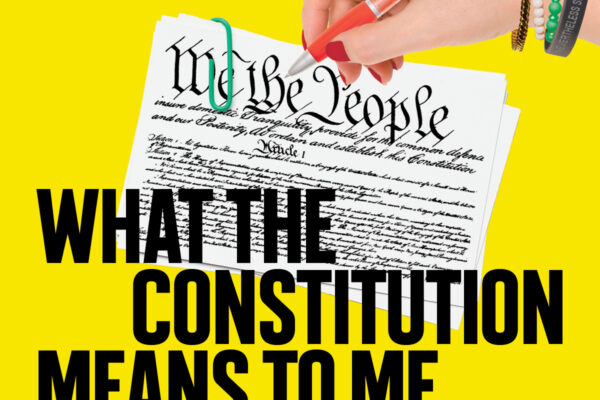 A hand signing on the constitution on a yellow background with the title of the play