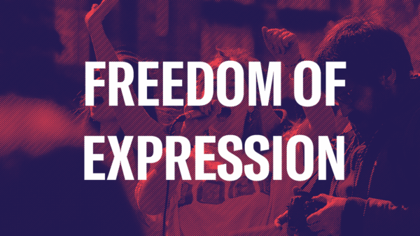 Student holding a megaphone during a protest