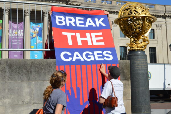 Banner reading "Break the cages"