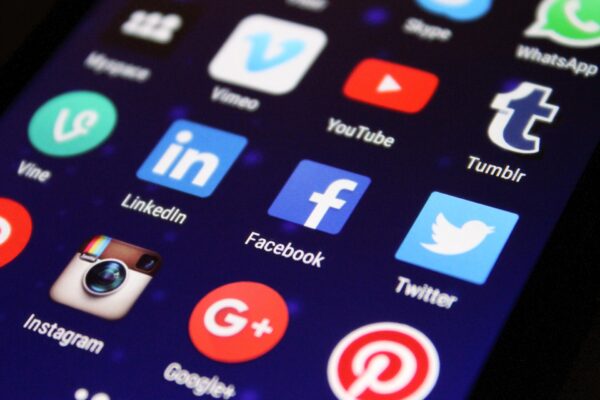 Home screen of smart phone featuring icons for social media apps