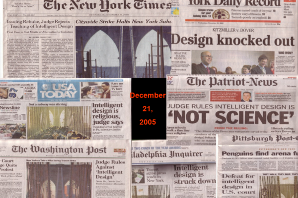 Newspaper front pages with headlines about Intelligent Design case