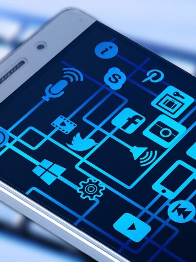 Cell phone image with a number of app icons visible on phone screen