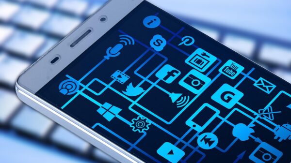 Cell phone image with a number of app icons visible on phone screen