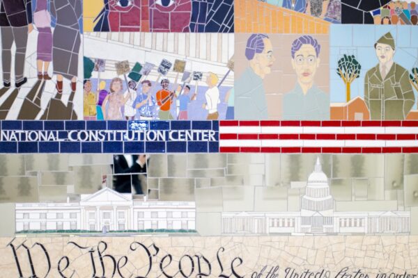 A photograph of a "We the People" mosaic found at the Constitution Center in Philadelphia.