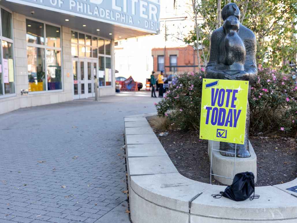 Sign in front of building that reads "Vote Today"