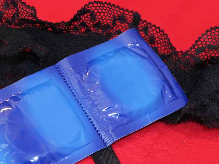 photo of lingerie and condoms